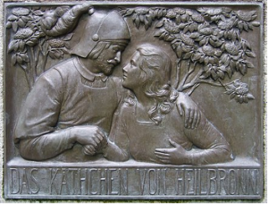 Bronzen plaat met twee personen afgebeeld
